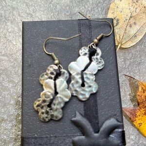 Silver colored flower earrings